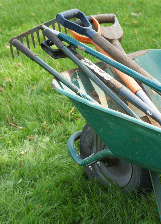 wheel-barrow wheel barrow with garden tools